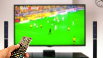 Partida de futebol na TV
